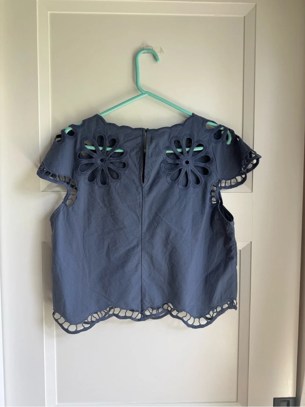 THE GREAT. Navy Eyelet Flutter Sleeve Blouse